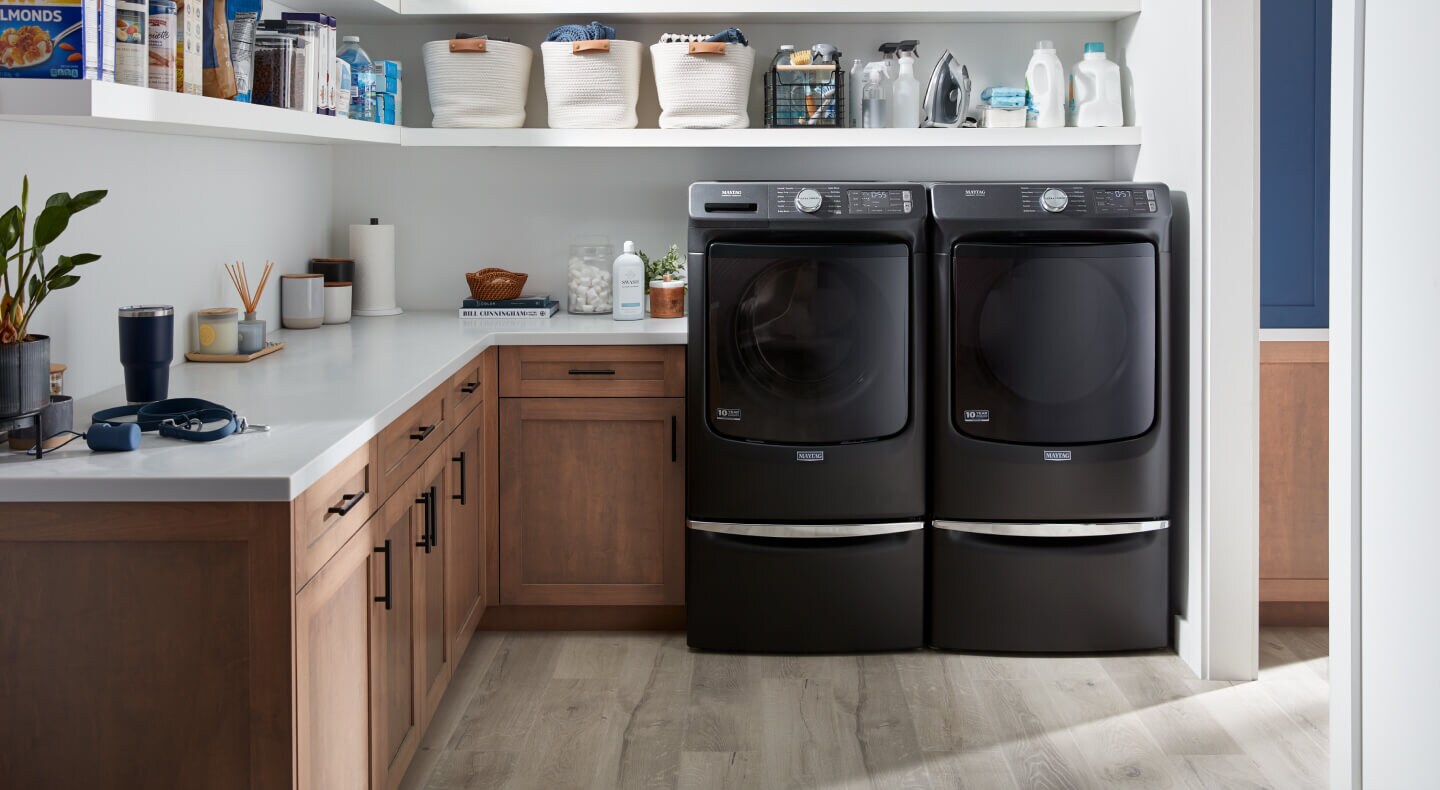 Washer and dryer set in a laundry room Washer and dryer set in a laundry room
