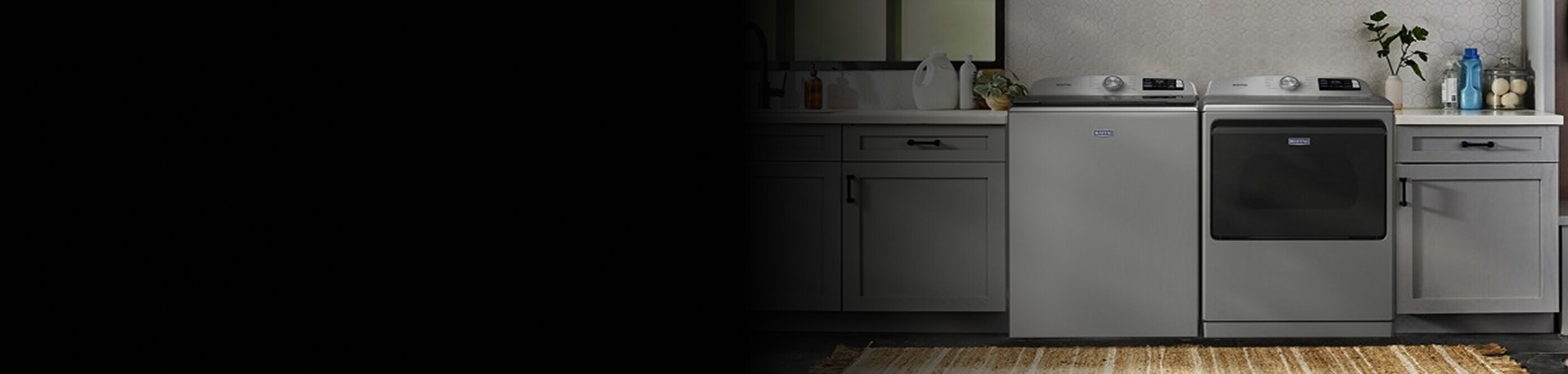 Maytag® top load laundry pair in gray cabinetry