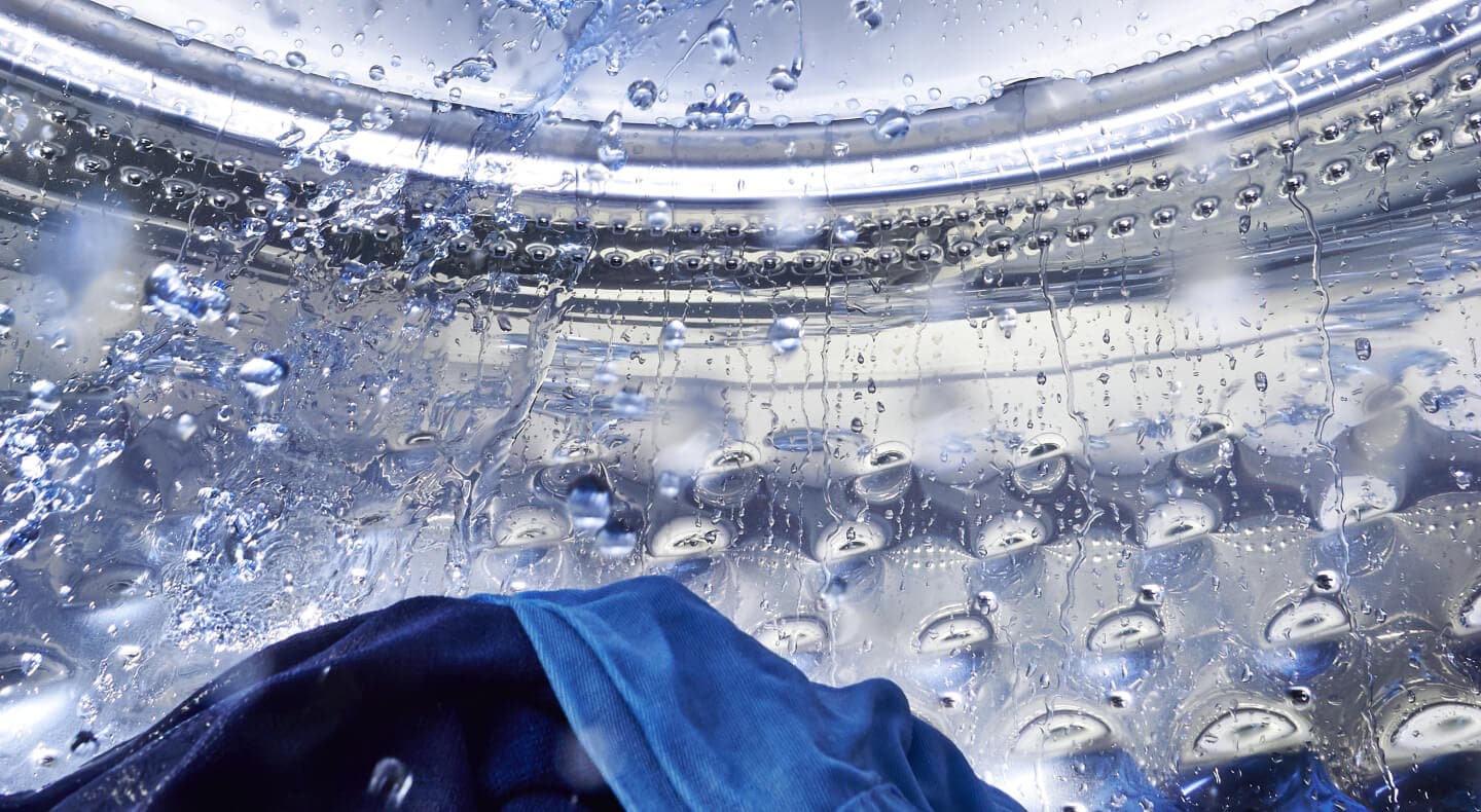 Water splashing in a Maytag® washing machine drum Water splashing in a Maytag® washing machine drum