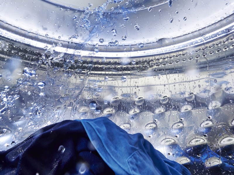 Water splashing in a Maytag® washing machine drum Water splashing in a Maytag® washing machine drum