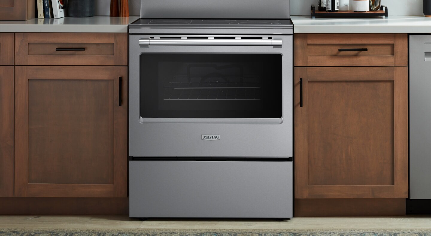 Electric Maytag® range in a kitchen