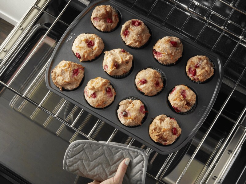 Muffins baking in an oven
