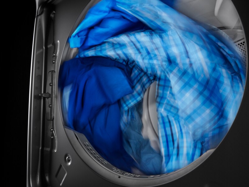 Clothing tumbling in a dryer Clothing tumbling in a dryer