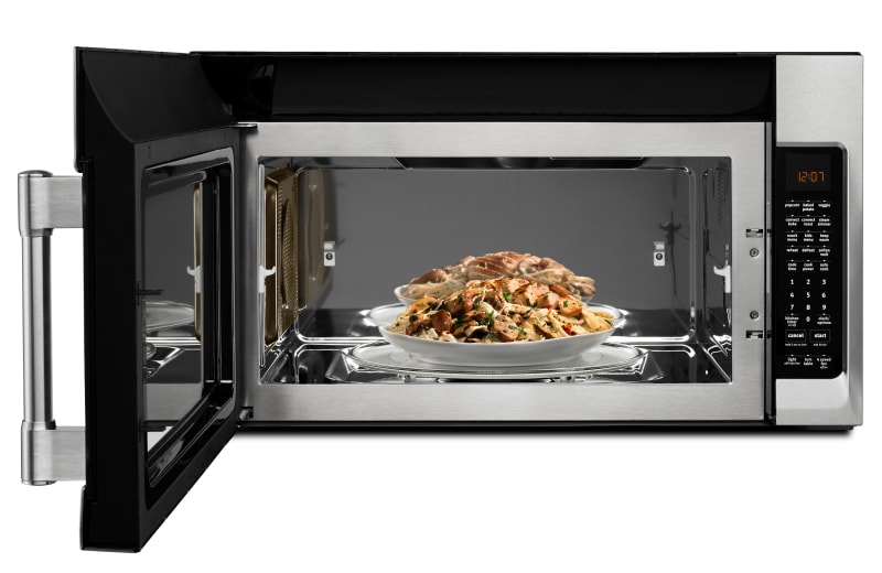 A bowl of food sits inside a Maytag® convection microwave. A bowl of food sits inside a Maytag® convection microwave.