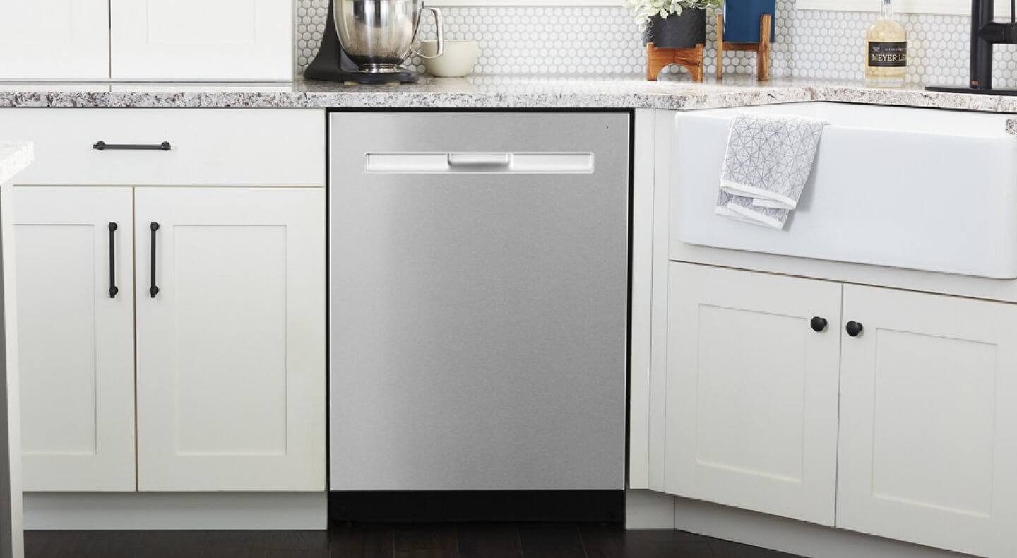 A Maytag® fully-integrated dishwasher in a modern kitchen