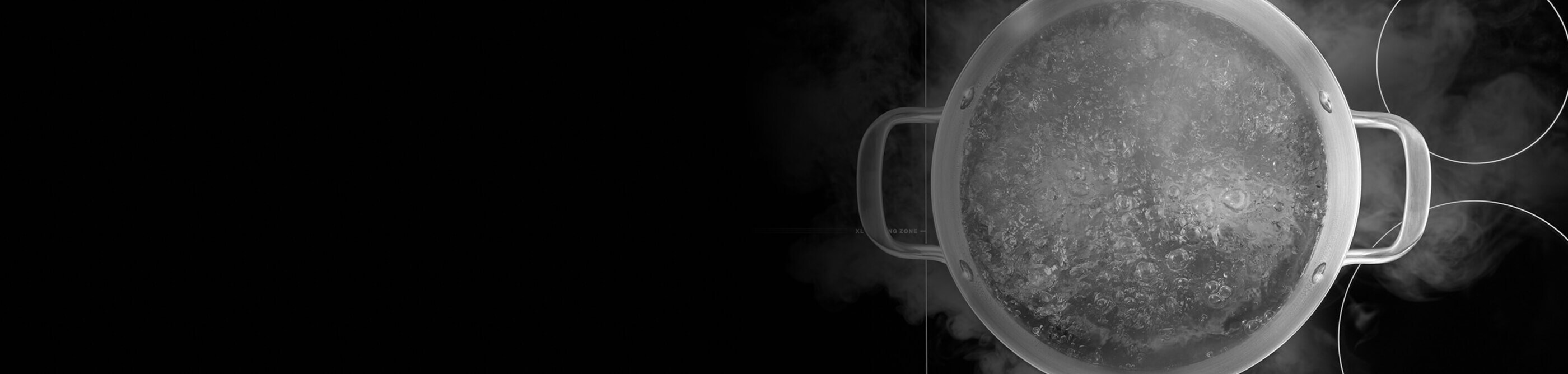 Pot of water boiling on a cooktop