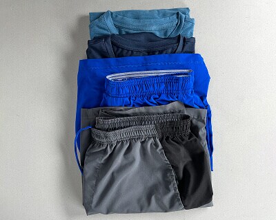 Stack of athletic shorts and T-shirts