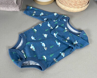 Partially folded long-sleeved onesie