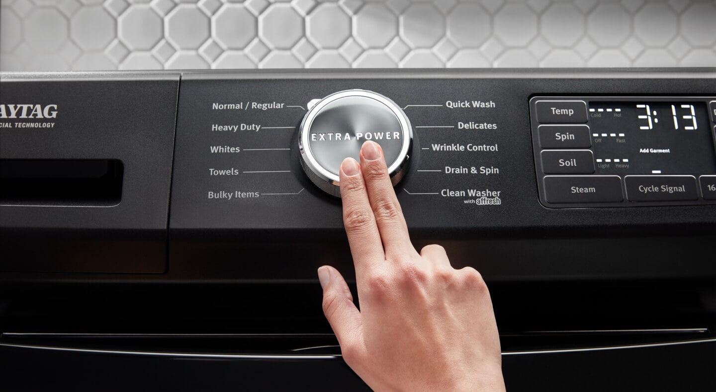 Person pushing the Extra Power Button