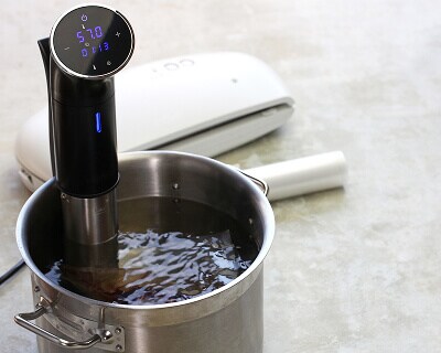 Pot of water with circulator tool in it