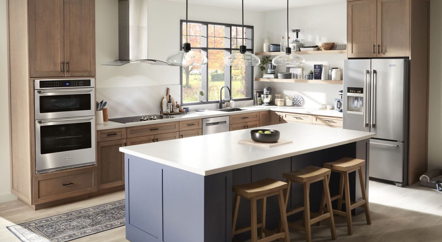 Large kitchen with an island in a work zone layout