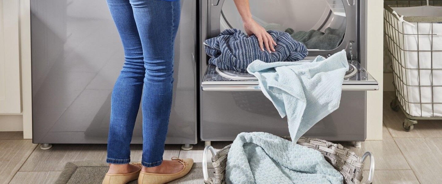 Top load laundry pair with an open dryer Top load laundry pair with an open dryer