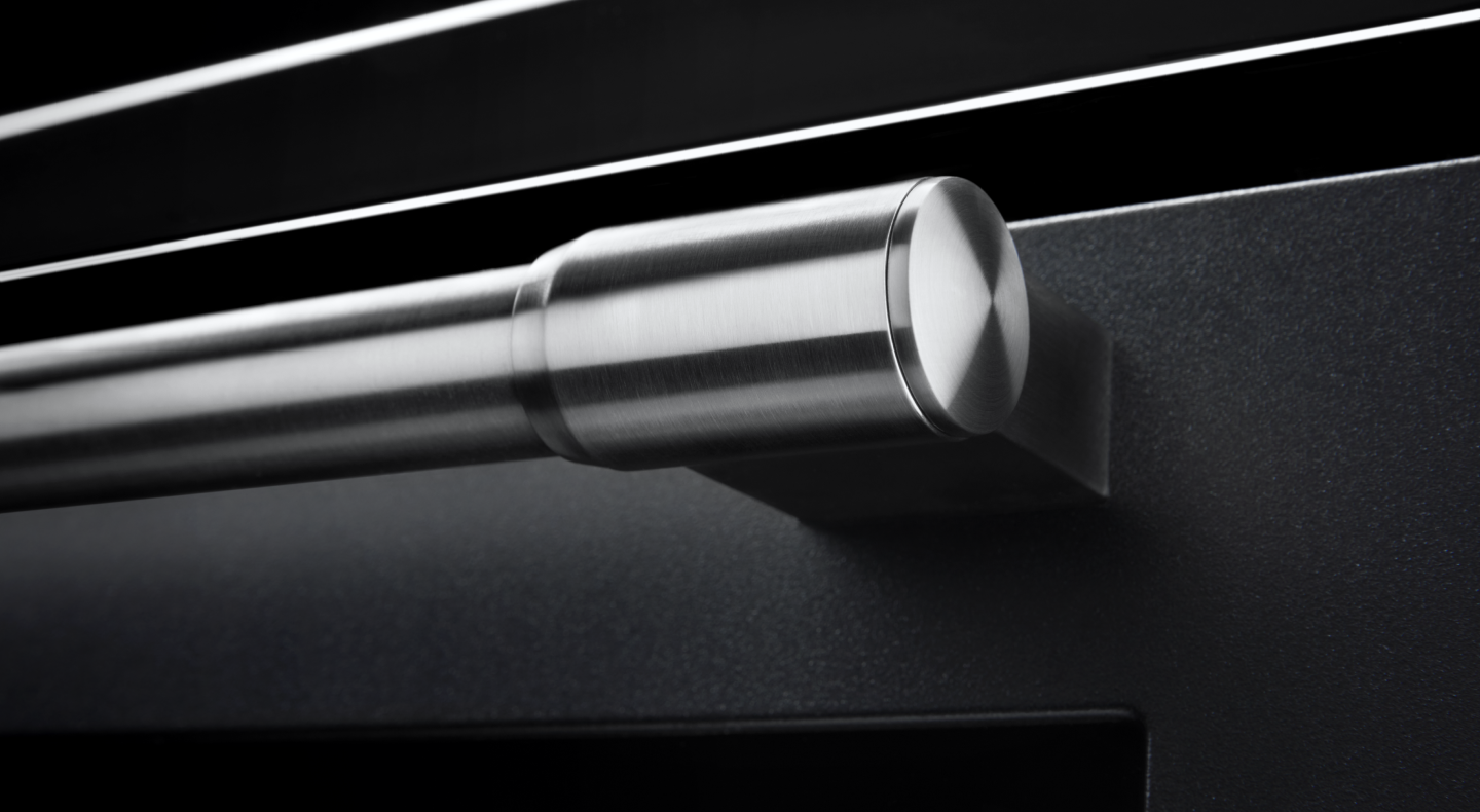 A closeup of a Maytag® oven handle A closeup of a Maytag® oven handle