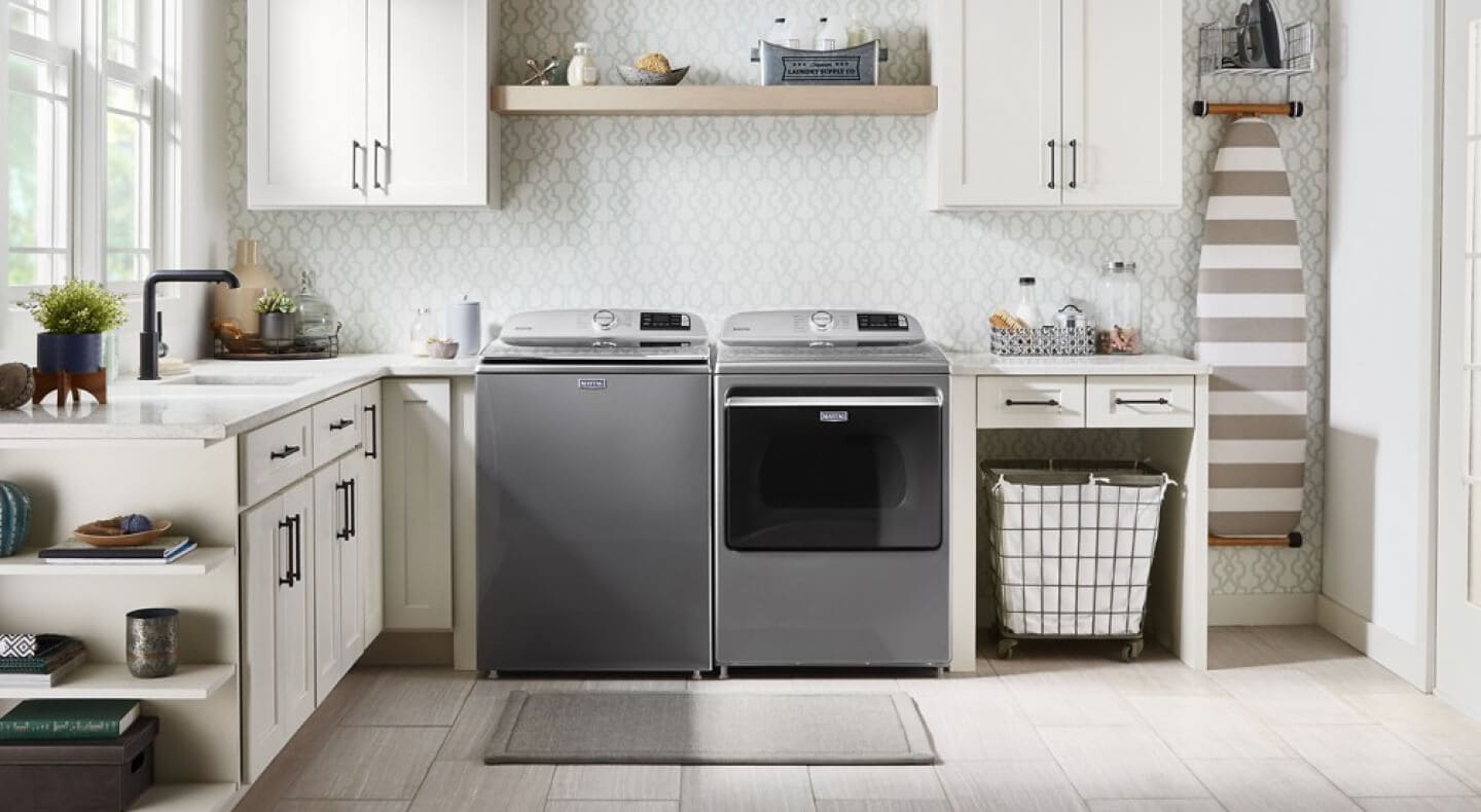 A Maytag® washer and dryer pair in a laundry room