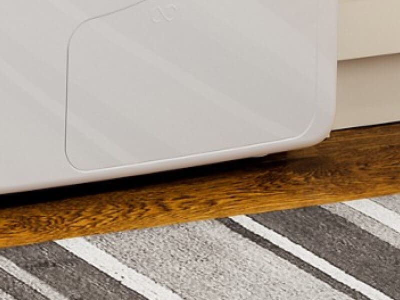 A closeup of the legs on a dryer