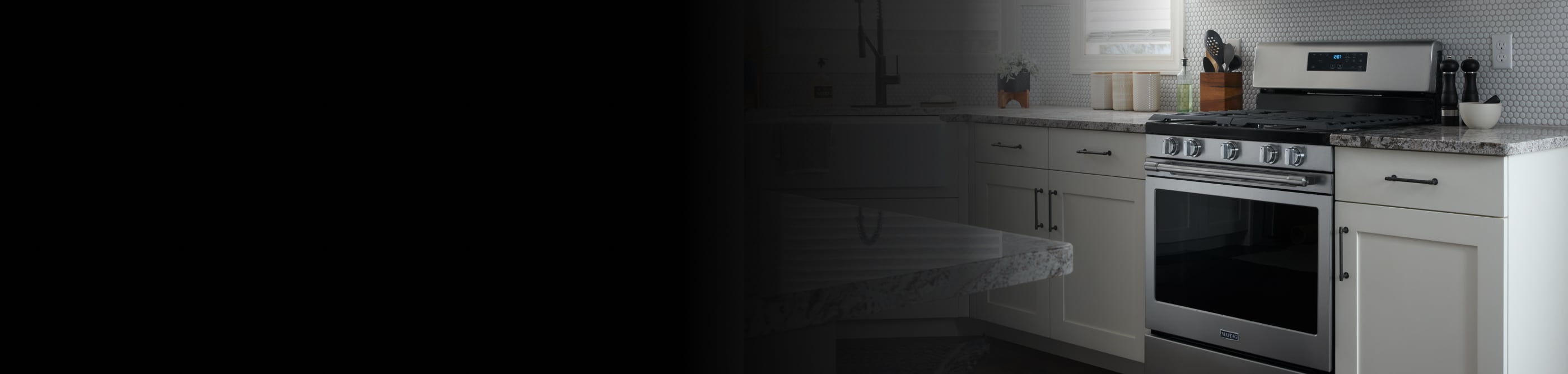 Maytag® range in white cabinetry