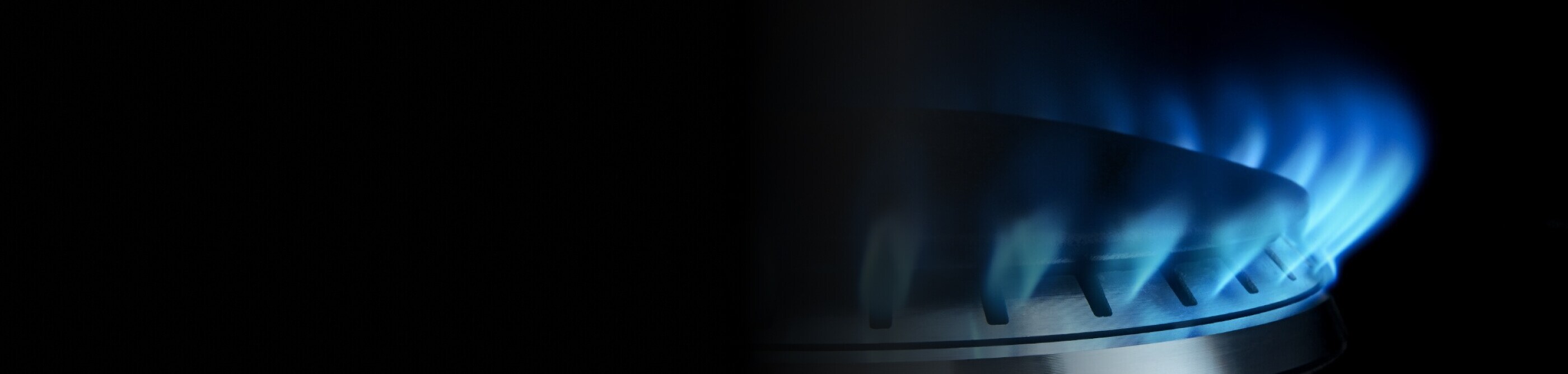 A close up of a Maytag® gas stove burner