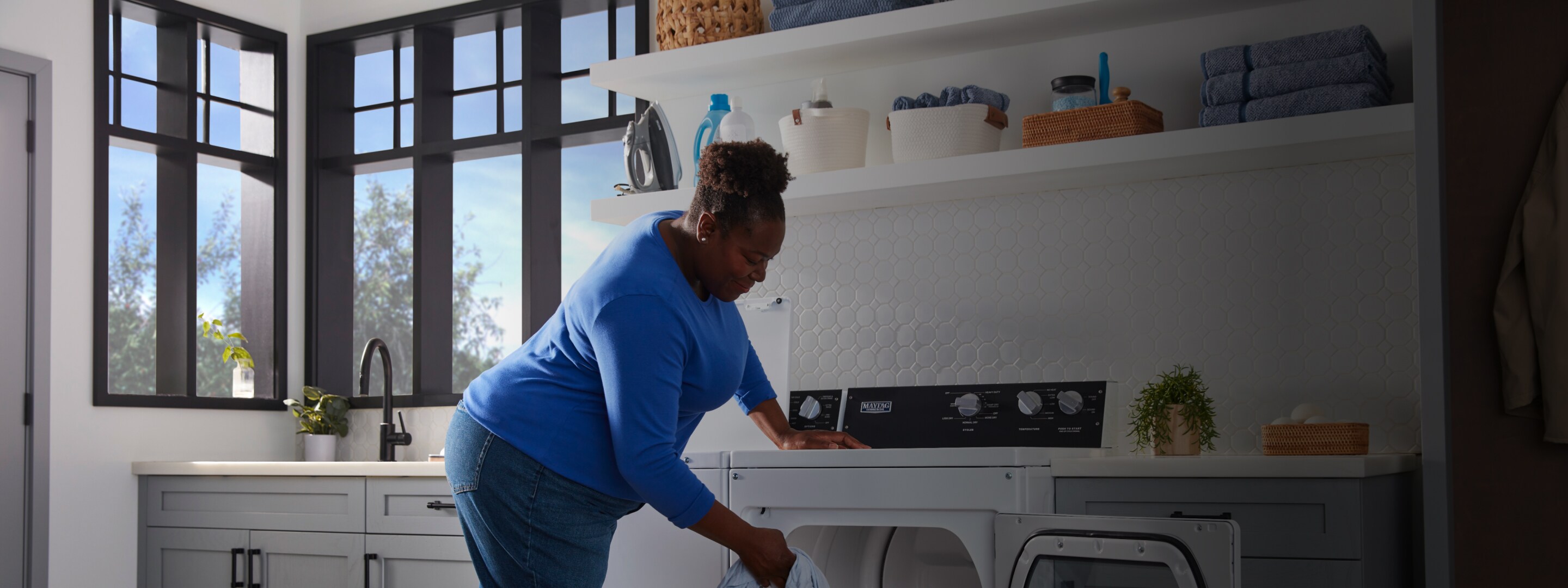 A person doing laundry.