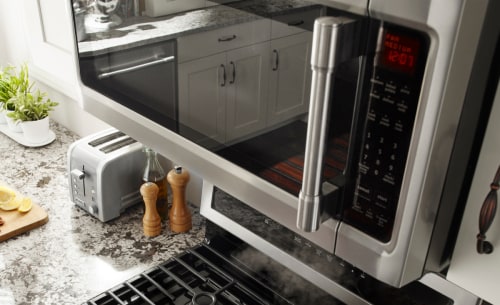 A closeup of a Maytag® over-the-range microwave