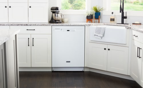 White front control dishwasher in a kitchen
