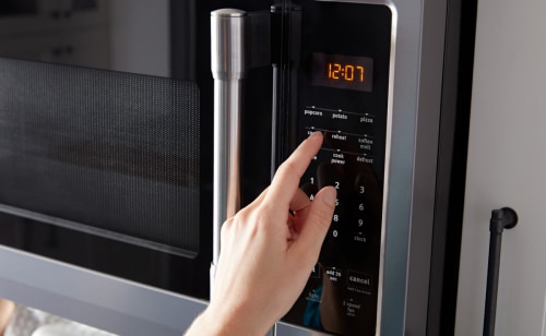 Close up image of a black microwave