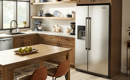 Kitchen with stainless steel Maytag® side-by-side refrigerator with an external ice and water dispenser