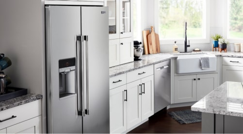  A side-by-side counter-depth refrigerator in a modern kitchen.