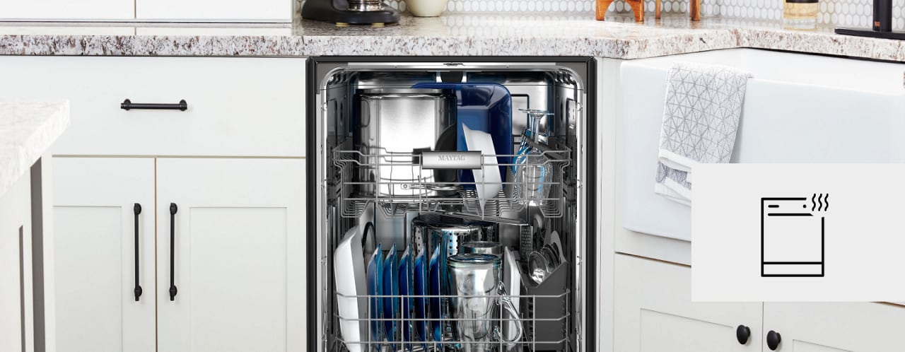 Open dishwasher in a white kitchen