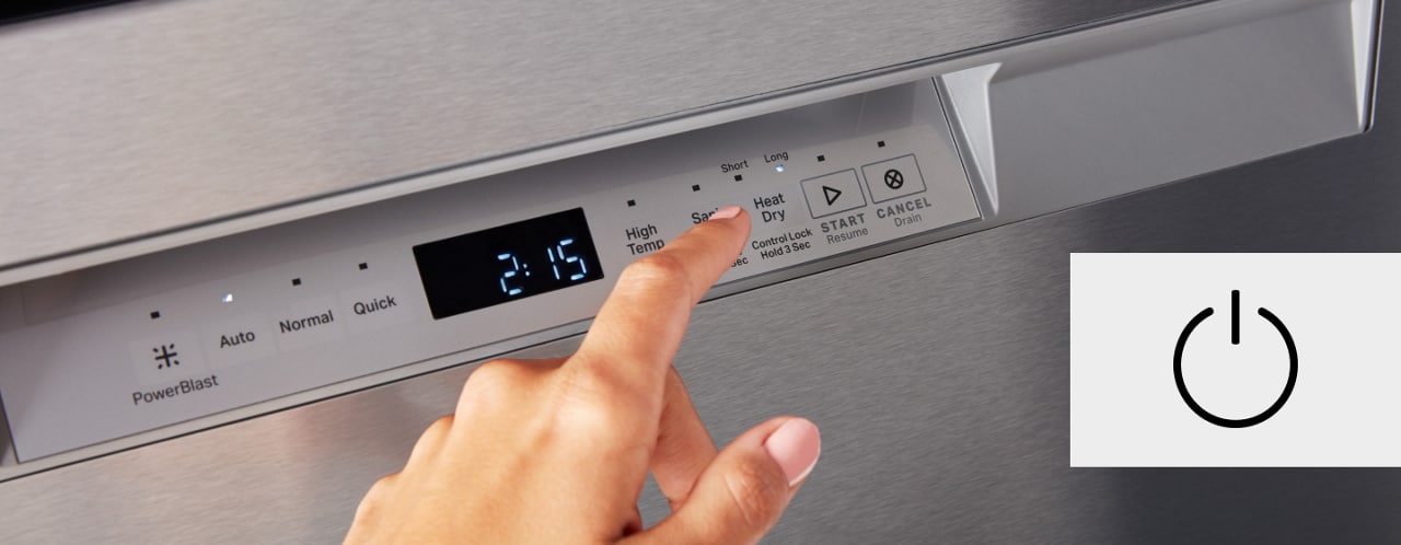 Hand selecting options on a dishwasher console