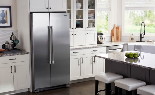 Maytag brand side-by-side refrigerator in a kitchen