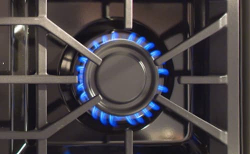 Bird’s-eye view of the blue flame of a gas burner