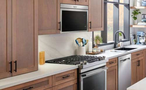 A Maytag® over-the-range microwave in a modern kitchen.