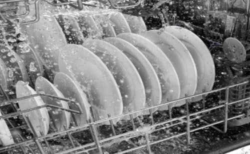 A dishwasher cleaning dishes
