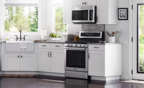 A Maytag® stove in a modern kitchen