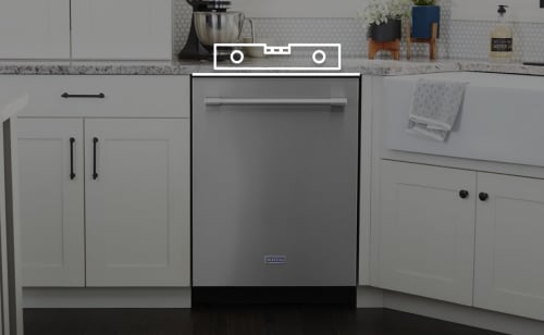Maytag® dishwasher in a kitchen with a level on top.