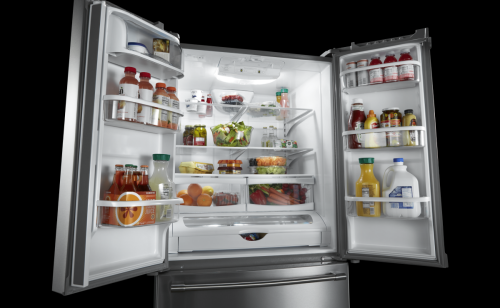 An open french door refrigerator with various food items inside