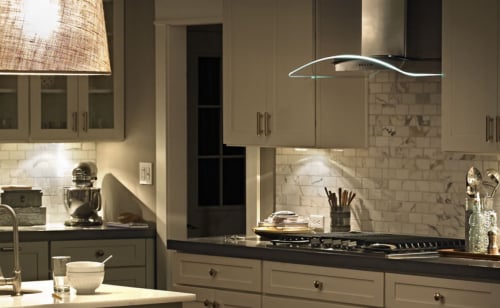Modern kitchen with white backsplash