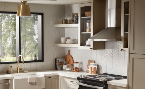 A rustic kitchen setting featuring various appliances and kitchen items
