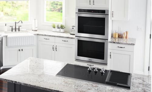 Wall oven in a white kitchen