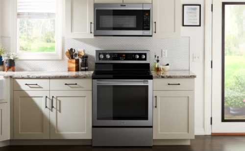 A slide-in range under an over-the-range microwave