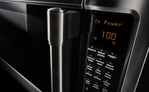 A closeup of a Maytag® microwave.