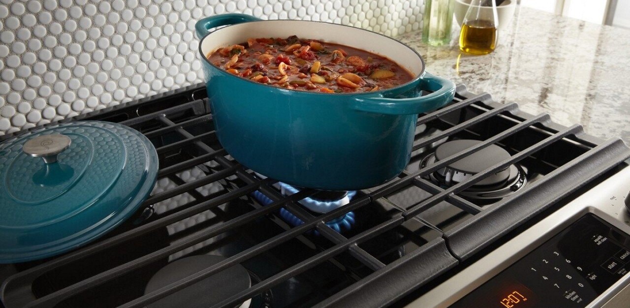 Stew cooking in an oval dutch oven on a gas stove Stew cooking in an oval dutch oven on a gas stove