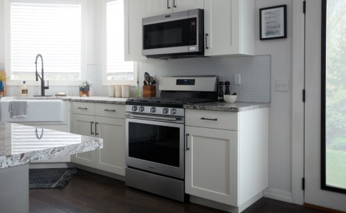 Maytag® range in white cabinetry