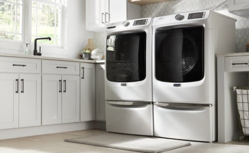 Maytag® washer and dryer in a modern laundry room
