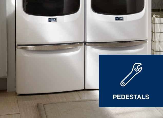Pedestals lifting a washer and dryer. 