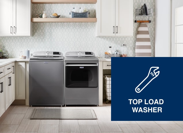 Top load laundry pair in a laundry room.