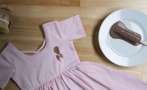 Chocolate stain on a baby pink shirt