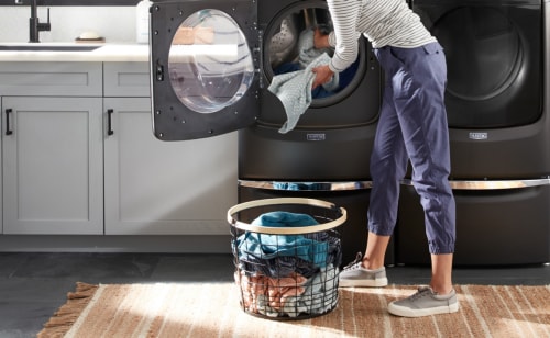 Unloading clothes from a dryer 