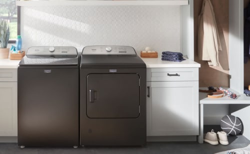 Laundry room featuring washer and dryer