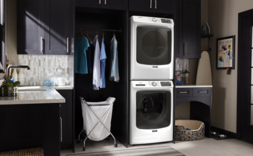 Maytag® stacked washer and dryer in a laundry room